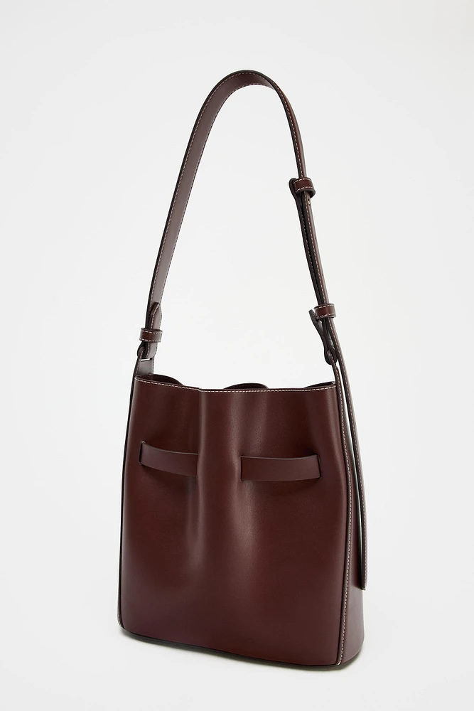 KNOTTED TOPSTITCHED BUCKET BAG