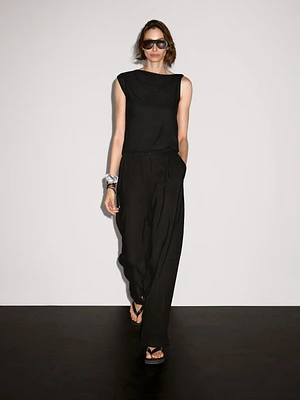 Asymmetric top with knot detail