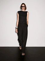 Asymmetric top with knot detail