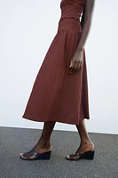 TEXTURED MIDI SKIRT