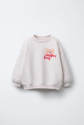 WARM AND COZY PRINT SWEATSHIRT