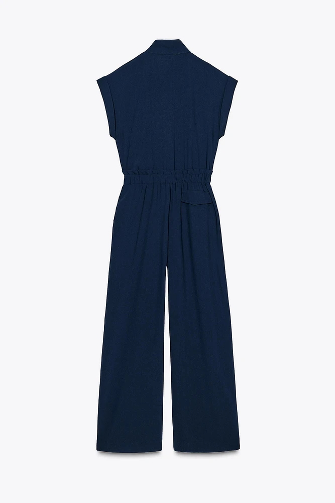 BELTED CREPE JUMPSUIT
