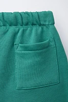 TEXT PLUSH SHORTS
