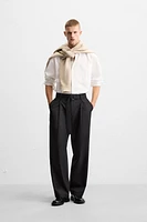PLEATED PANTS WITH BELT