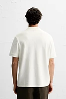 POLO À COL ZIPPÉ