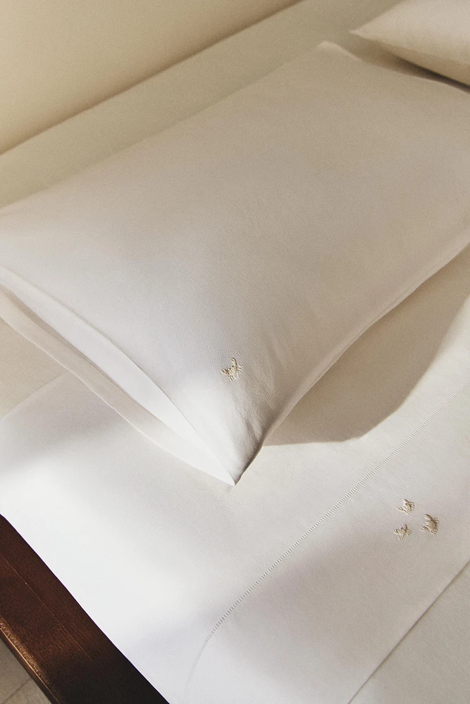 PILLOWCASE WITH EMBROIDERED CRAB