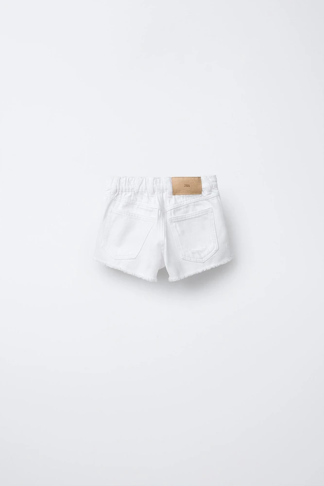 SHORT EN DENIM DÉCHIRÉ