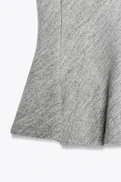 TEXTURED PEPLUM TOP