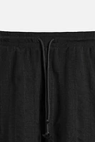 TEXTURED JOGGER SHORTS