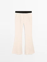 Pantalon flare taille contrastante