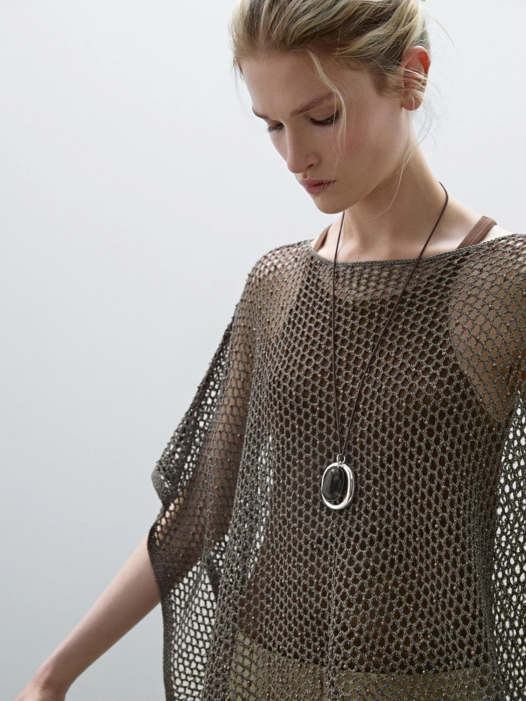 Short cutwork cape