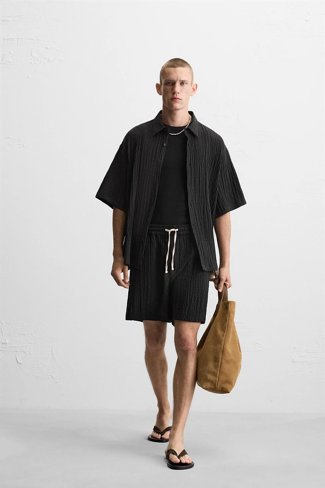 WRINKLED EFFECT JACQUARD BERMUDA SHORTS