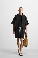 WRINKLED EFFECT JACQUARD BERMUDA SHORTS