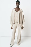 ASYMMETRIC RIBBED CAPE