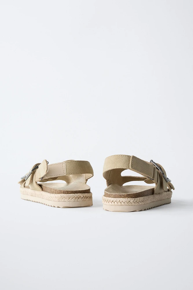 LEATHER SANDALS WITH JUTE BUCKLES
