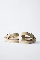 LEATHER SANDALS WITH JUTE BUCKLES