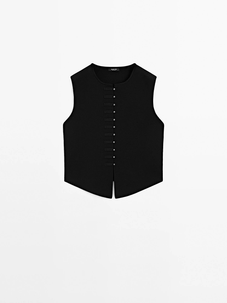 Veste sans manches en maille boutons fantaisie