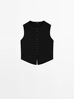 Veste sans manches en maille boutons fantaisie