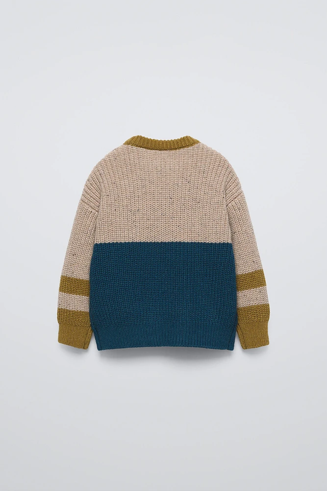 COMBINATION KNIT SWEATER
