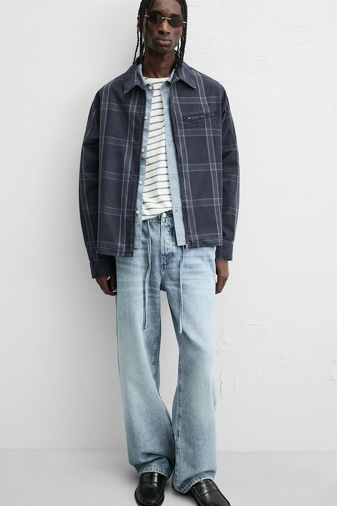 VESTE À CARREAUX ZIPPÉE