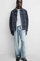 VESTE À CARREAUX ZIPPÉE