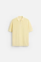 POLO EN MAILLE PERLÉE À ZIP