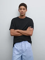 Short sleeve pyjama top and striped trousers