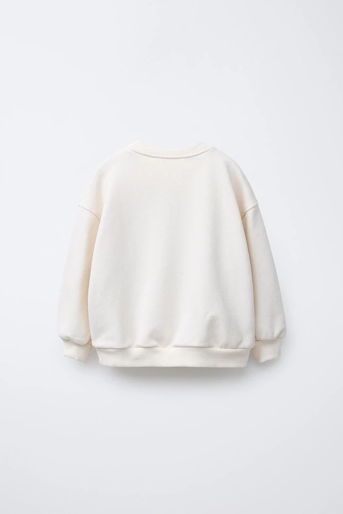 MINNIE MOUSE © DISNEY BOW SWEATSHIRT