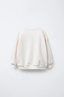 MINNIE MOUSE © DISNEY BOW SWEATSHIRT