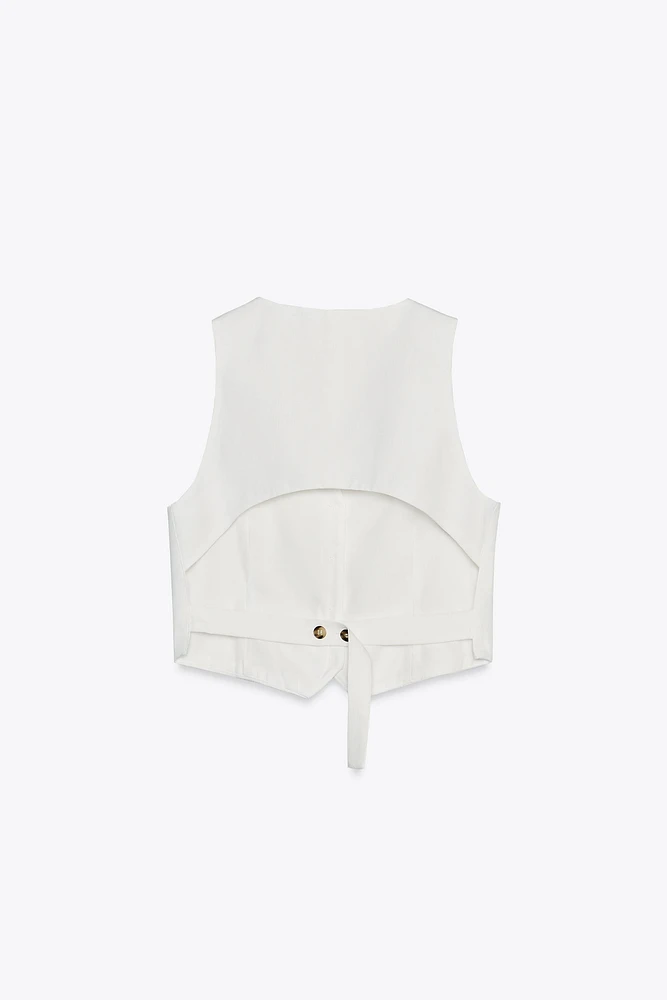 GILET AJOURÉ AU DOS