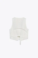 GILET AJOURÉ AU DOS