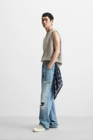 DISTRESSED KNIT VEST