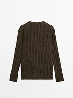 Pull en maille tressée à col V