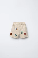 HÔTEL MAGIQUE © X ZARA PATCH SHORTS