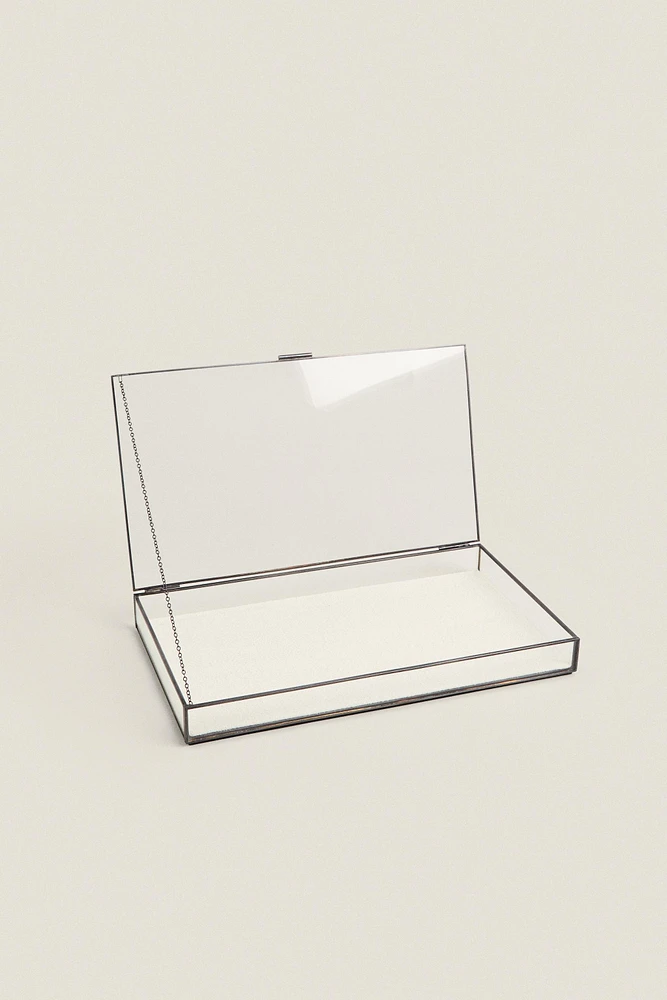 JEWELRY BOX WITH A BLACK METAL BORDER