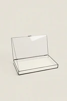 JEWELRY BOX WITH A BLACK METAL BORDER