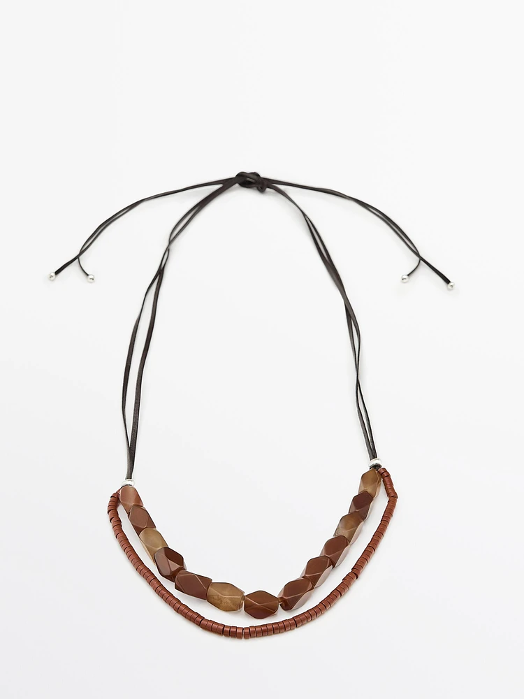 Collier pierre double cordon en cuir