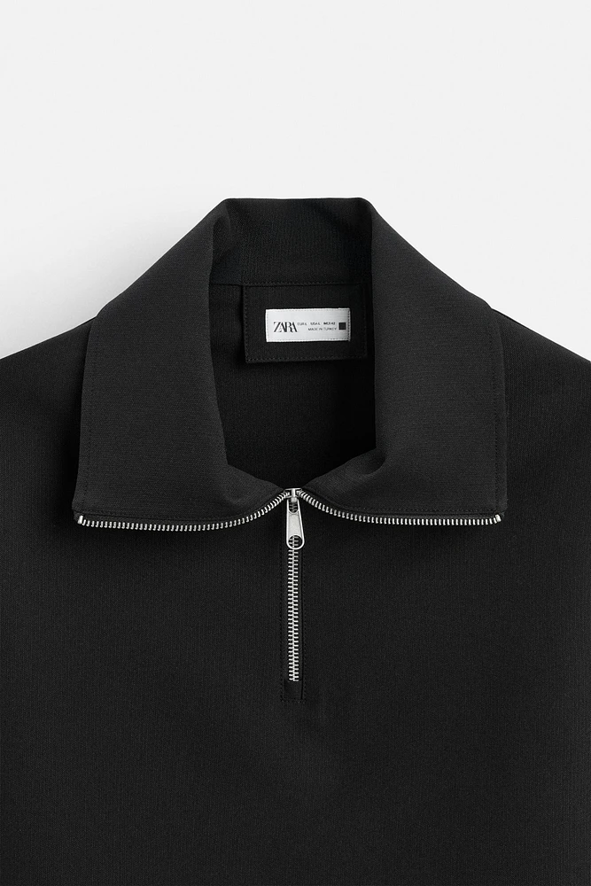 TECHNICAL QUARTER-ZIP SWEATSHIRT