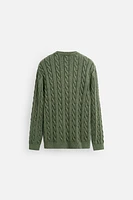 WASHED CABLE-KNIT SWEATER