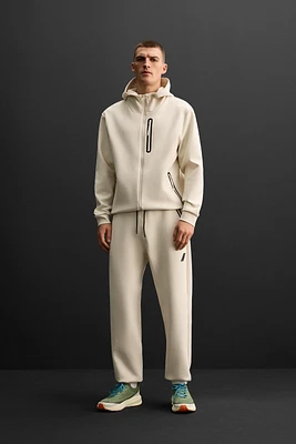 TECHNICAL ZIPPER JOGGER PANTS