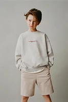 HEATHERED TEXT SWEATSHIRT