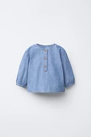 CHEMISE EN JEAN FLUIDE À COL TUNISIEN