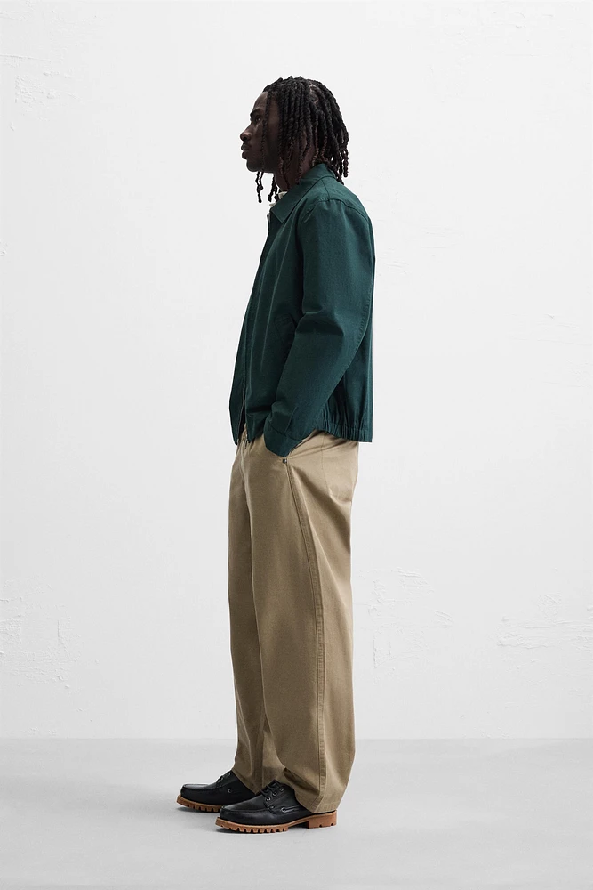 PANTALON RELAXED FIT À PLIS