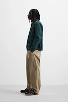 PANTALON RELAXED FIT À PLIS