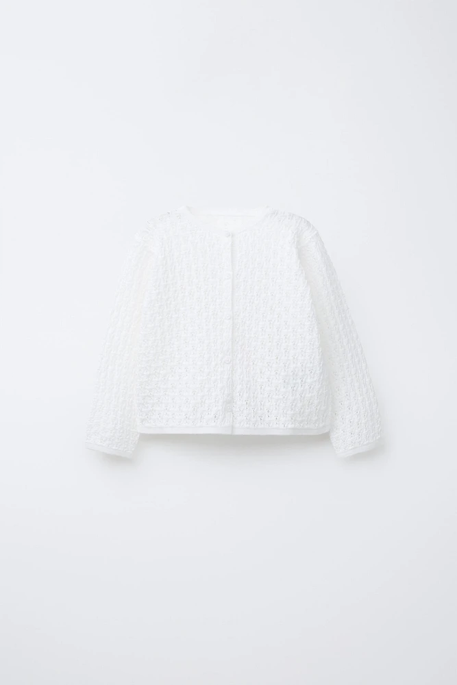 GILET EN MAILLE AJOURÉE