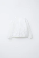 GILET EN MAILLE AJOURÉE