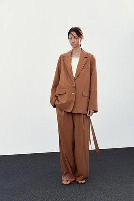 VESTE OVERSIZE À CEINTURE