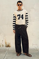 LIMITED EDITION SUEDE WIDE FIT PANTS