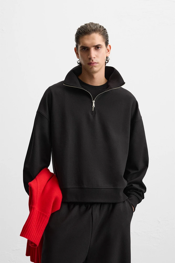 TECHNICAL QUARTER-ZIP SWEATSHIRT