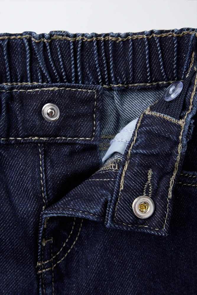 JUPE-CULOTTE EN JEAN À NŒUDS